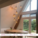 Grote videlamp schuin plafond boven eettafel 2 meter